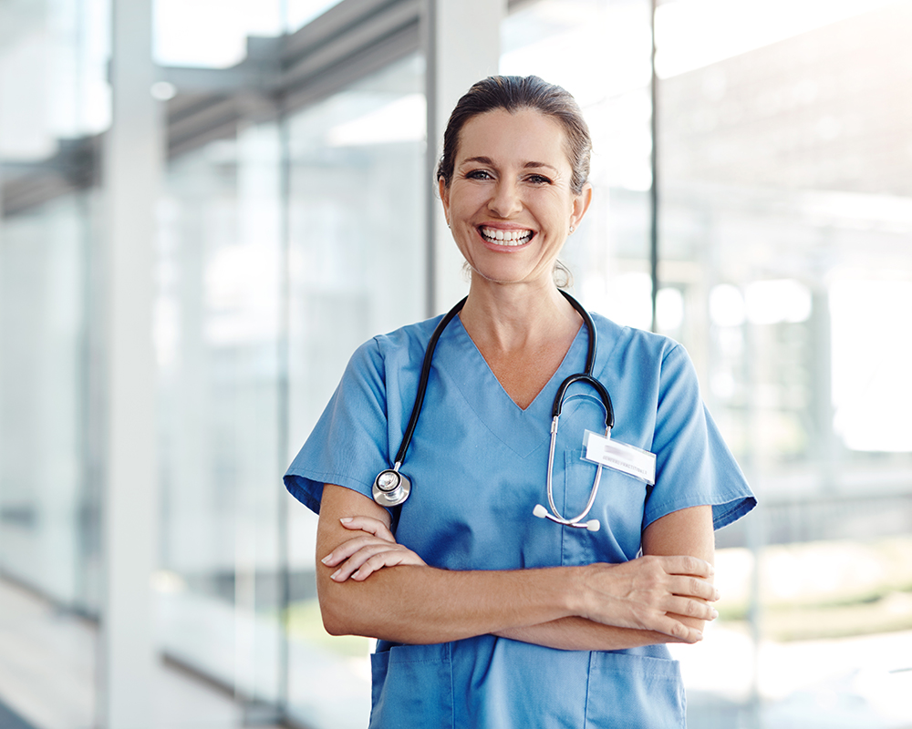 Doctor smiling at her office