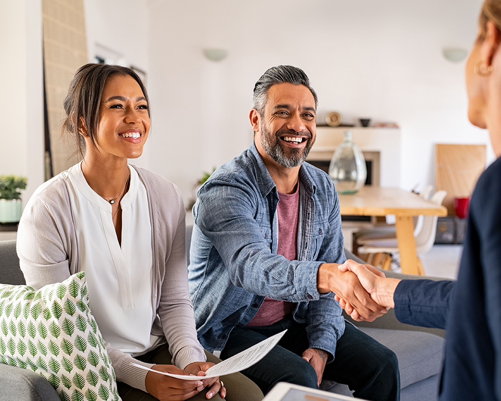 couple meeting with their financial advisor